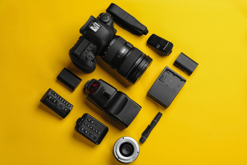 Flat,Lay,Composition,With,Photographer's,Equipment,And,Accessories,On,Color